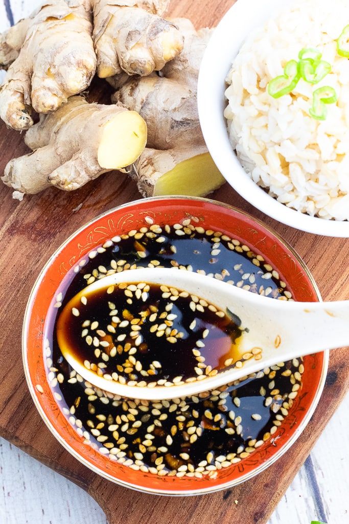 sweet ginger sauce in asian bowl with soup spoon