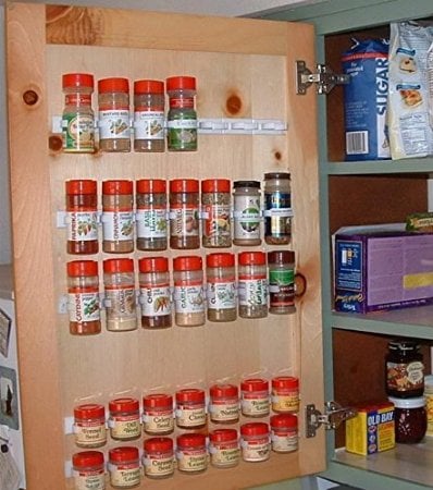 spice clips installed on cabinet door.