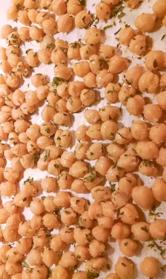 chickpeas on baking sheet with parchment paper