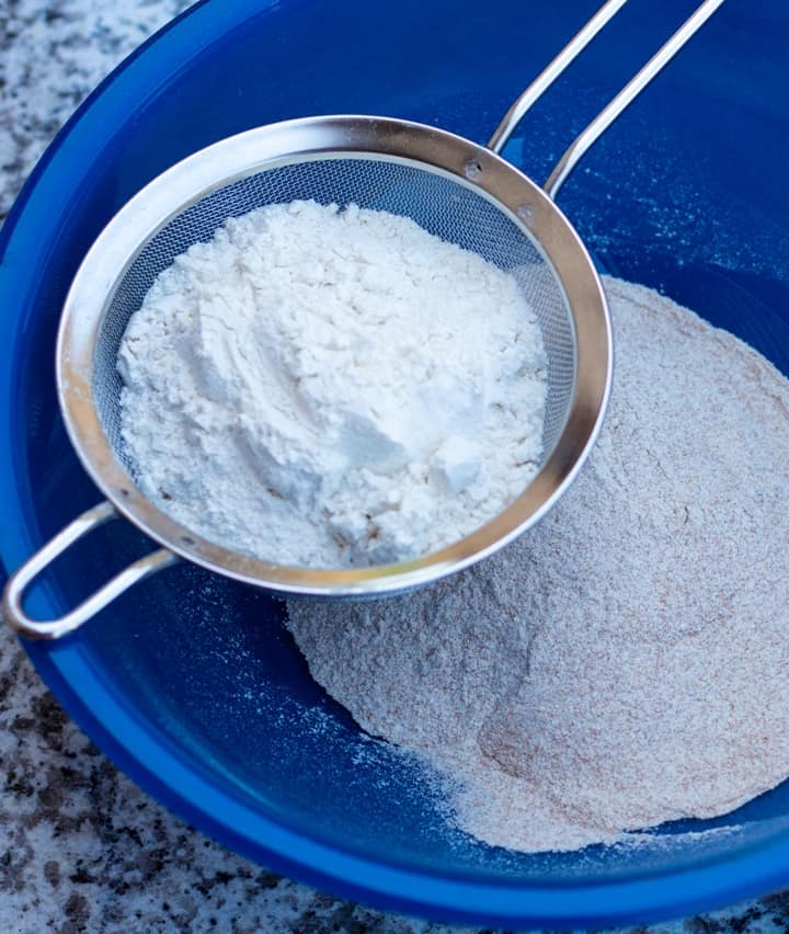 flour and sift in large blue bowl