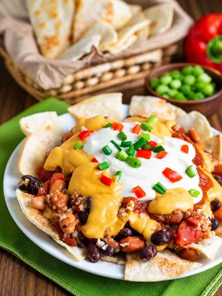 vegan-nacho-supreme with corn chips.