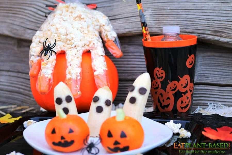 halloween treats popcorn hands and banana ghosts