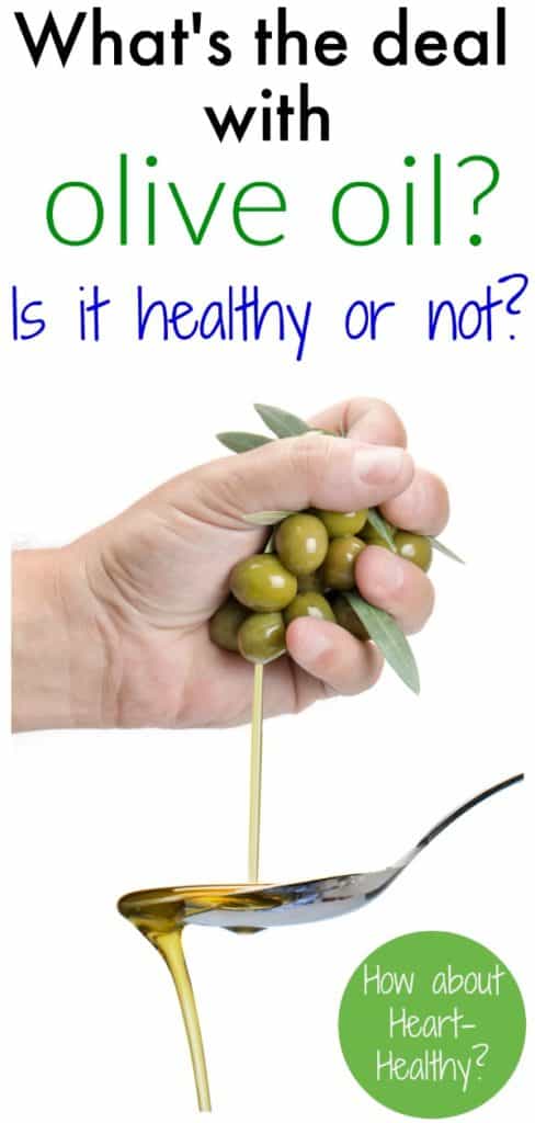 olives being squeezed by a hand into a spoon pinterest photo