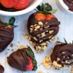 chocolate dipped strawberries on white table