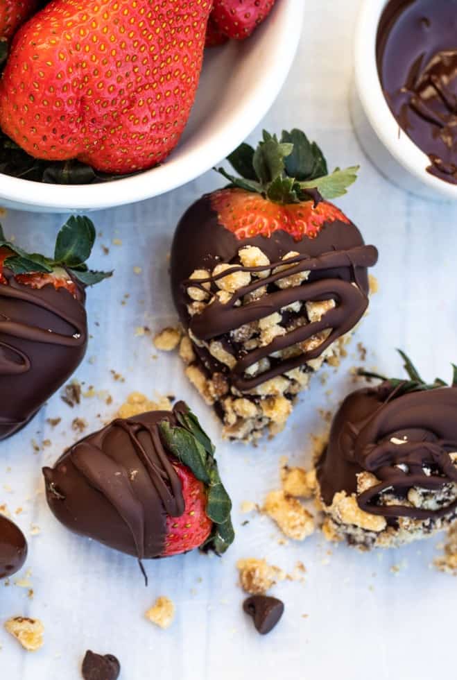 chocolate dipped strawberries on white table