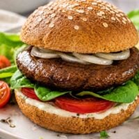 marinated and cooked portobello on a whole wheat bun.