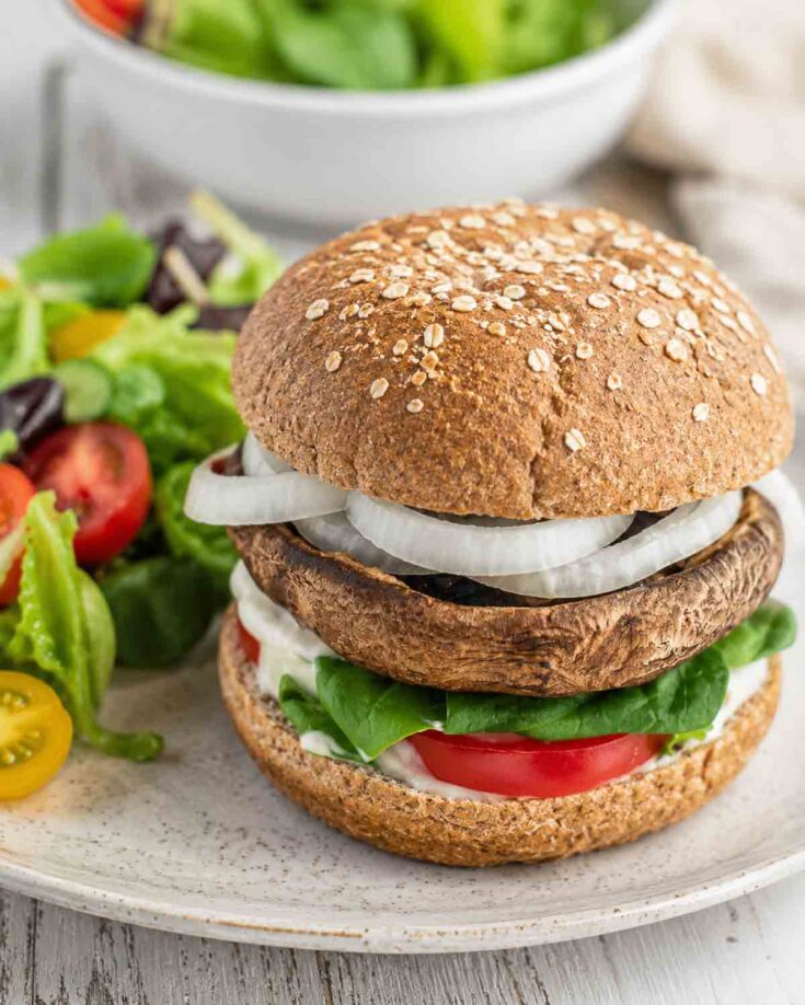 grilled portobello mushroom on whole grain bun with lettuce, tomatoe, and onion.