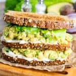 Chickpea Avocado Salad sandwich stacked on cutting board