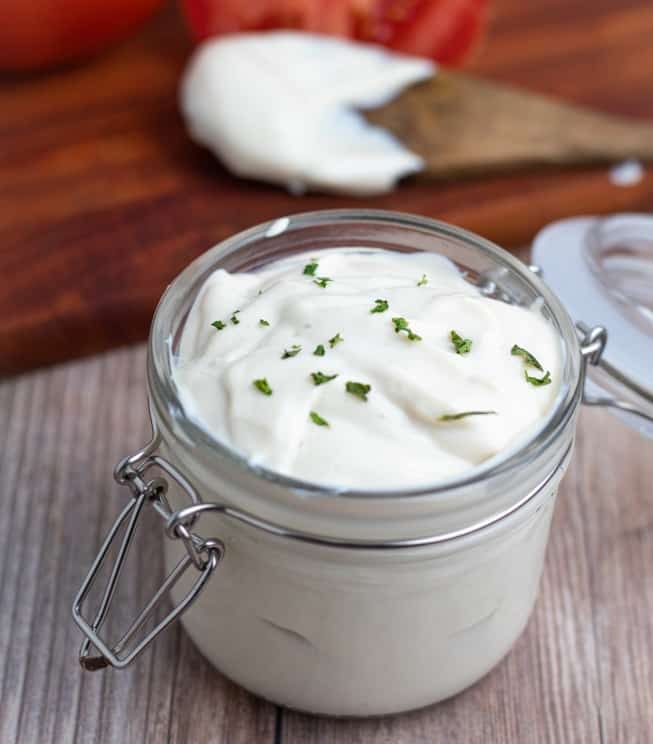 vegan mayonnaise in jar on wooden table