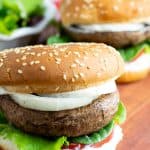 portobello burgers on cutting board