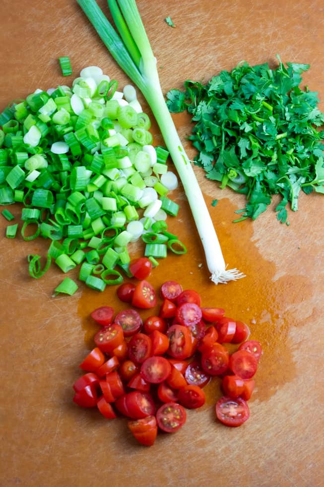 diced green onion, tomatoes, and cilantro