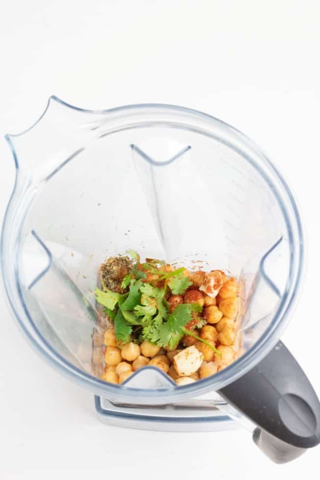 chickpeas, cilantro, and spices in blender before mixing
