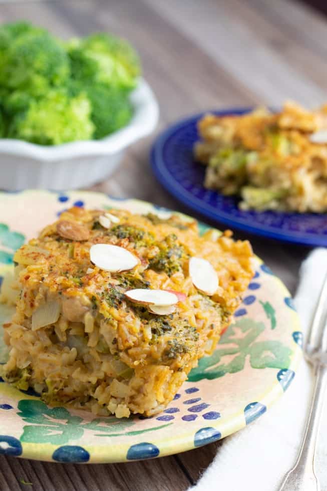 vegan broccoli casserole served on colorful plate on wooden table