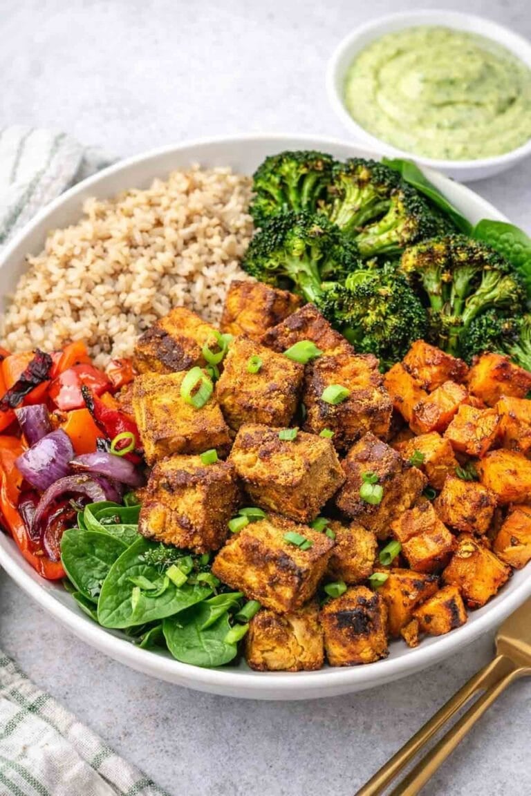 plant-based grain and rice bowl topped with air fryer tofu.