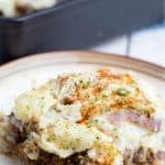 serving of vegan lentil shepherd's pie on white plate