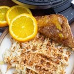 overhead photo of crispy hash browns with waffle iron in background