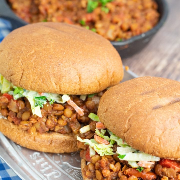 two lentil sloppy joes on whole wheat buns on plater