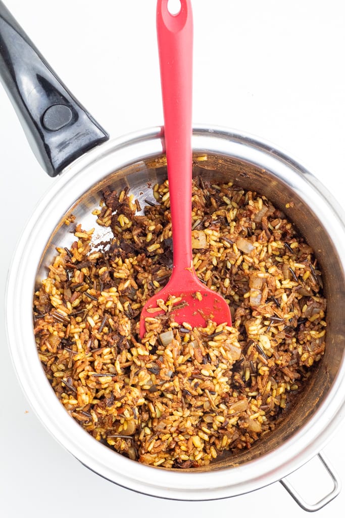 stainless pot with wild rice cooking