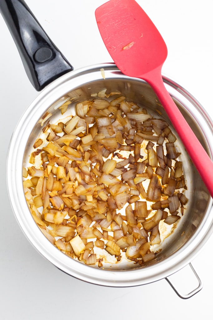 stainless pot with browned onions