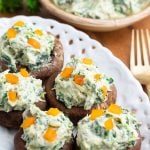 white plate with stuffed mushroom caps