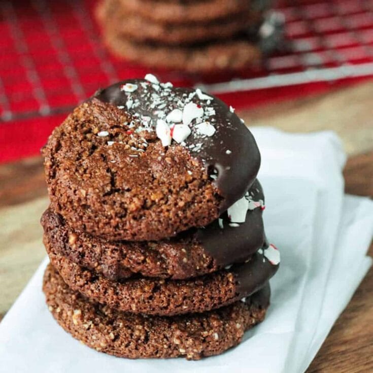 vegan chocolate molasses cookies stack on white napkin on table