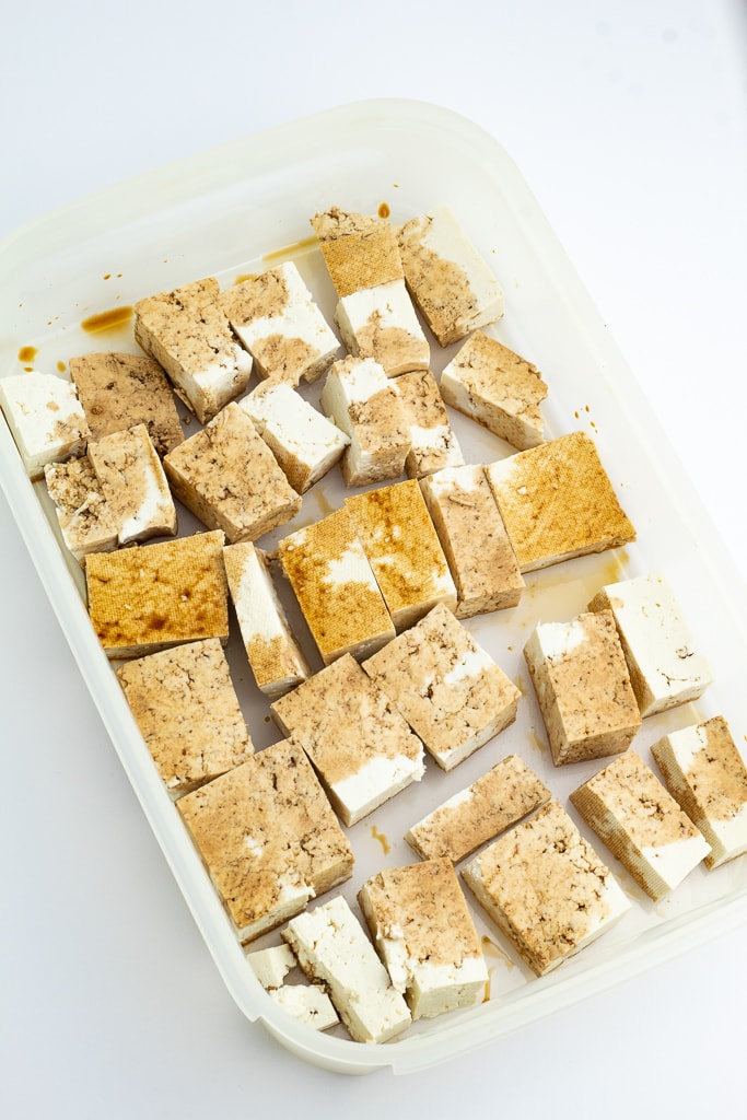 tofu chunks marinating in ginger sesame sauce