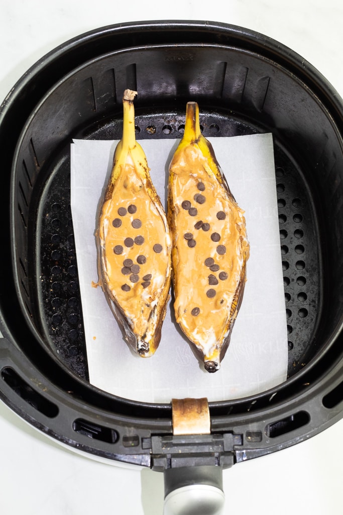 banana boats with peanut butter and chocolate chips in an air fryer