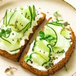 vegan cucumber sandwich on white plate