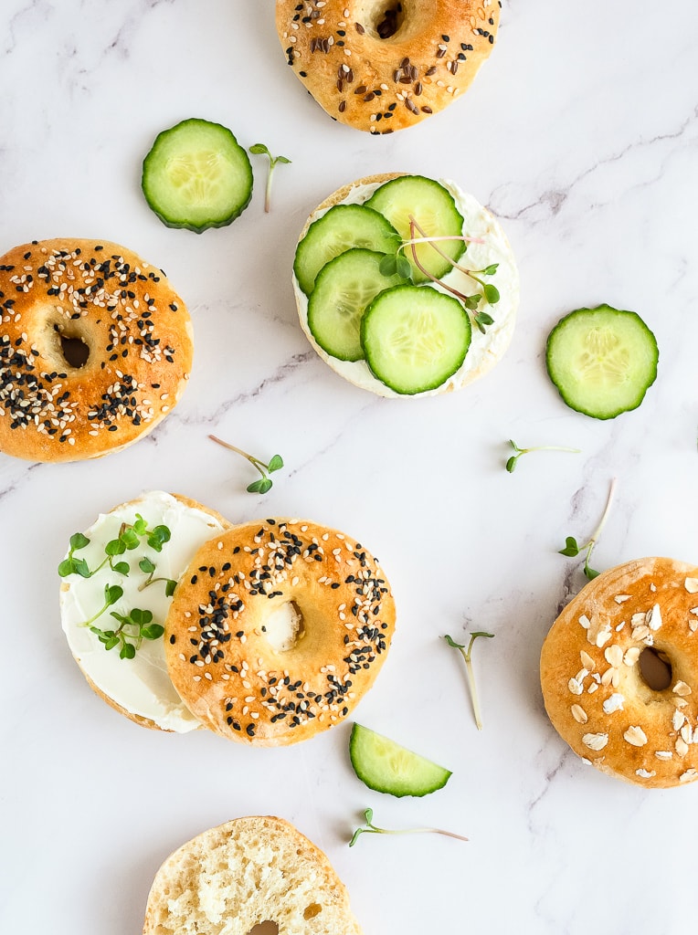 overhead shot of cucumber slices on bagels