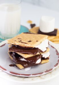 graham crackers stuffed with melted chocolate and marshmallows