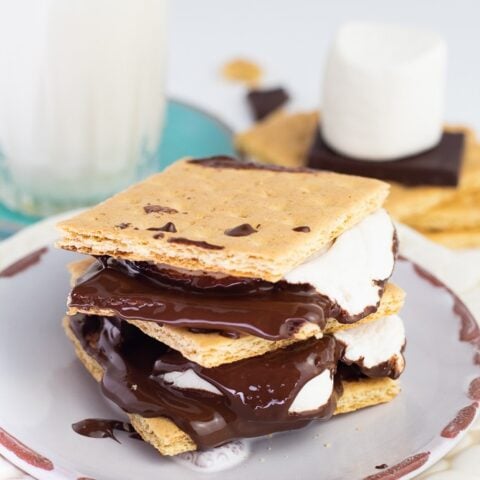 graham crackers stuffed with melted chocolate and marshmallows