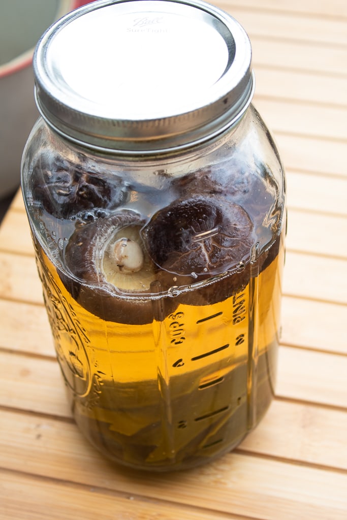 glass jar of dashi stock after it has marinated overnight