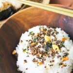 asian wooden bowl filled with rice and homemade furikake with chopsticks