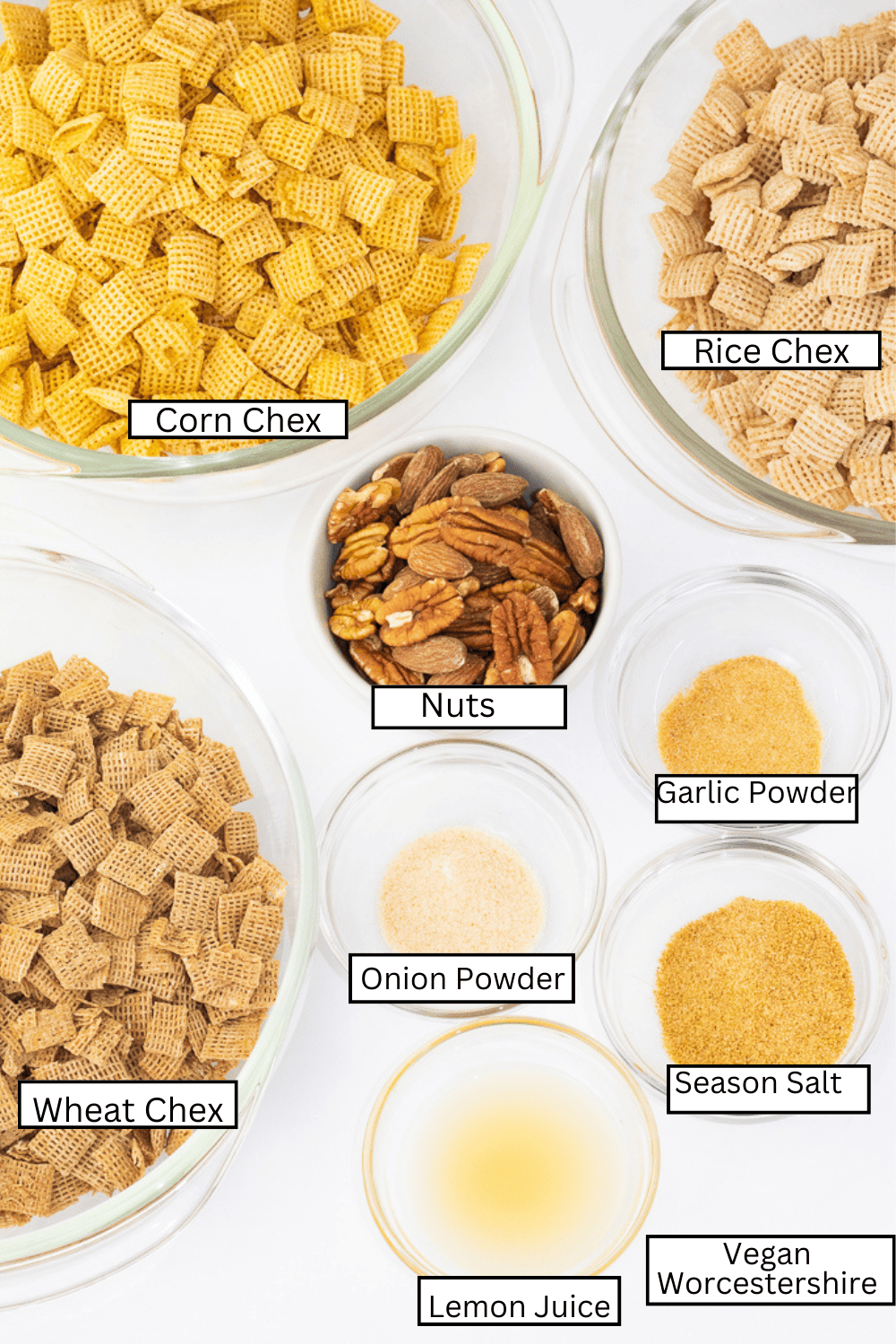 ingredients for chex mix on white background and labeled