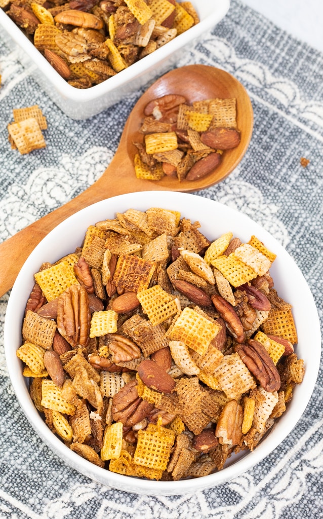 overhead shot of white bowl of chex mix