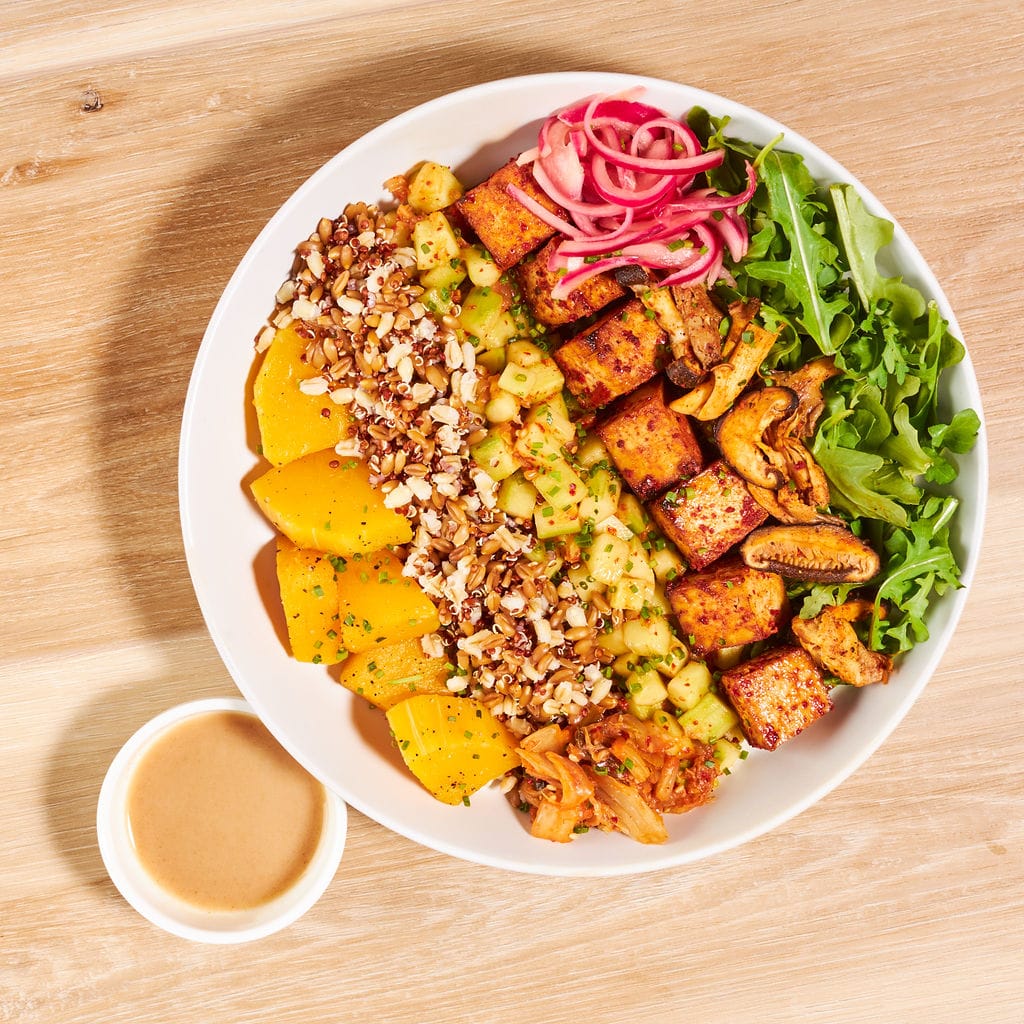 plant-based poke bowl overhead shot with sauce on the side