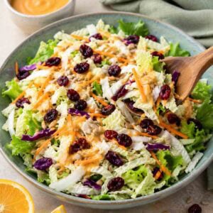 large bowl of napa cabbage salad with miso dressing.