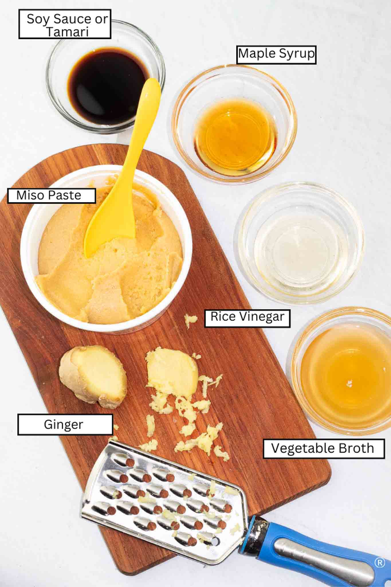 overhead photo with labeled ingredients to make miso dressing.