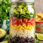 mexican soup in a mason jar with ingredients in layers.