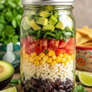 mexican soup in a mason jar with ingredients in layers.