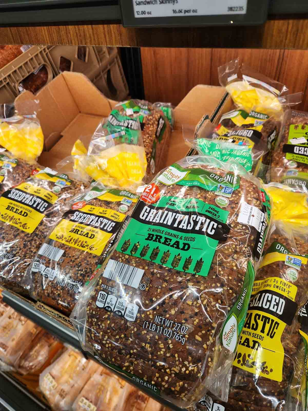 oil-free whole grain bread options on grocery shelf.