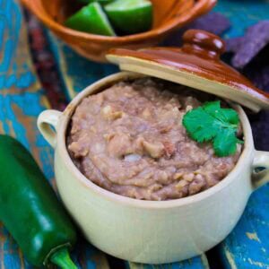 mexican refried beans in a crock.