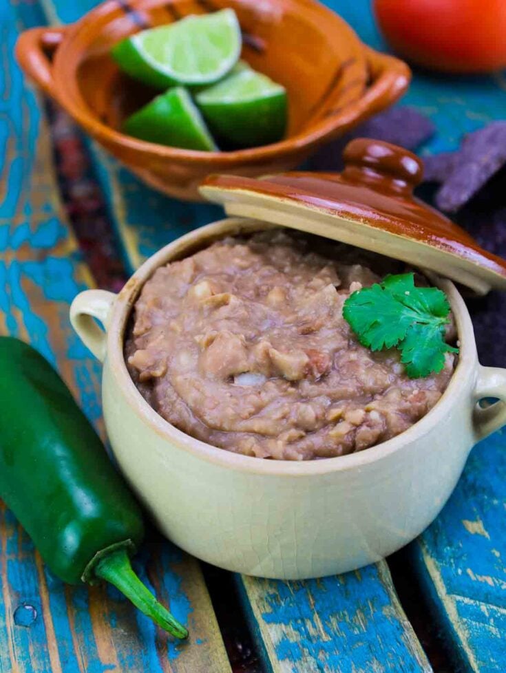 mexican refried beans in a crock.