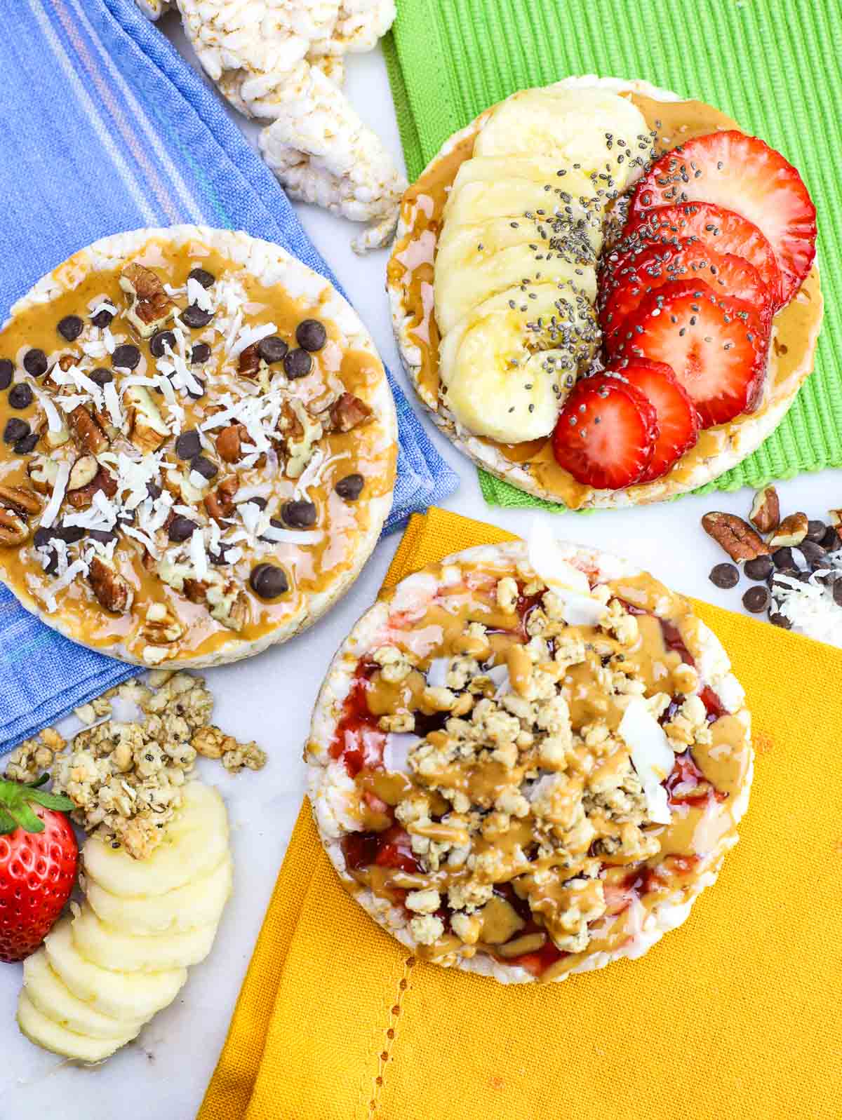 close up of dessert rice cakes with different toppings.