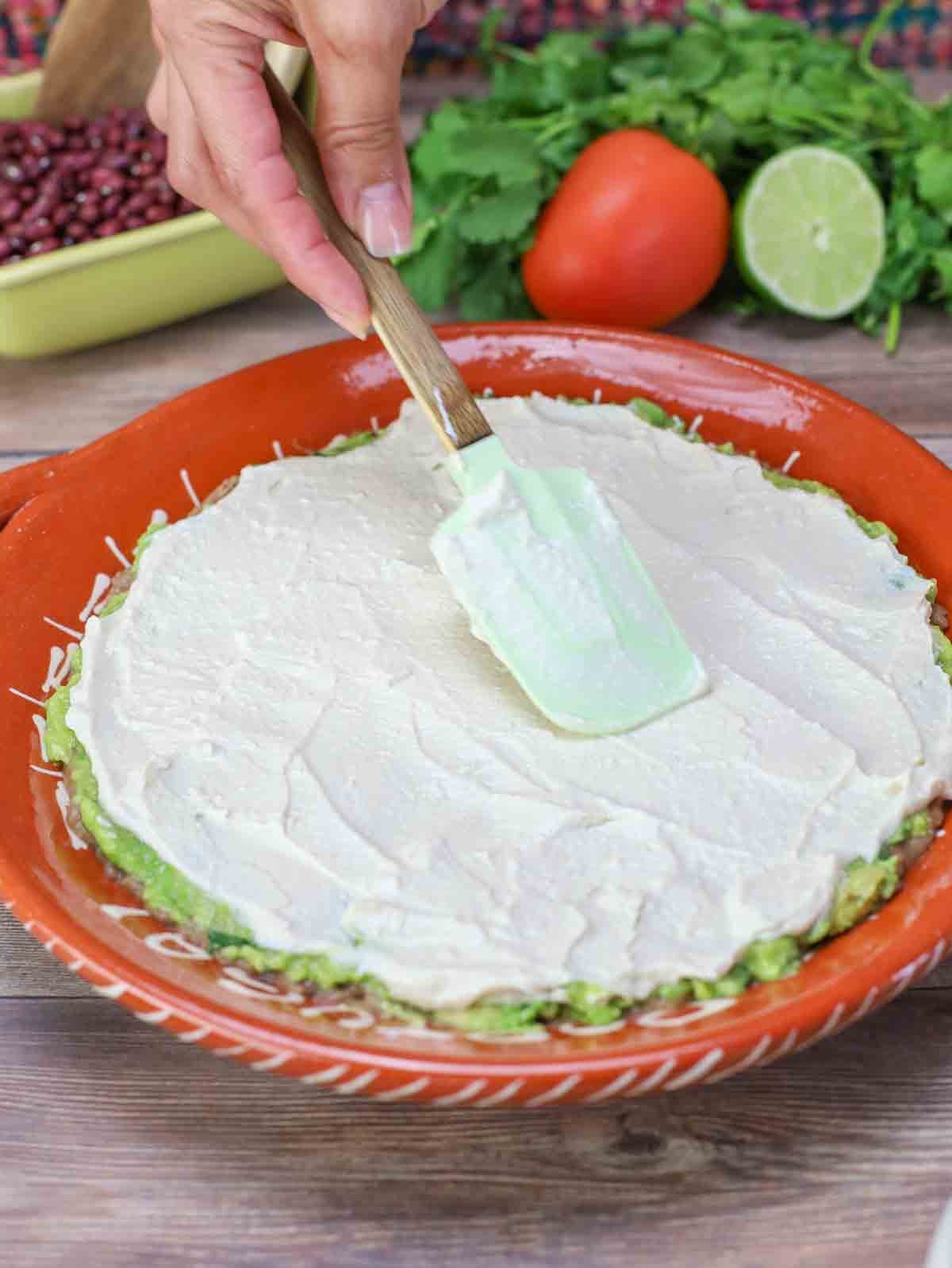 tofu sour cream layer of 7-layer bean dip.