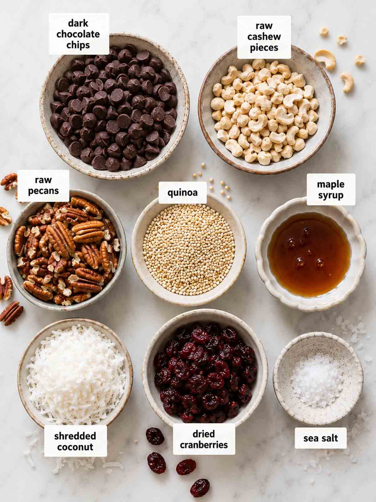 ingredients for chocolate bark in bowls and labeled.