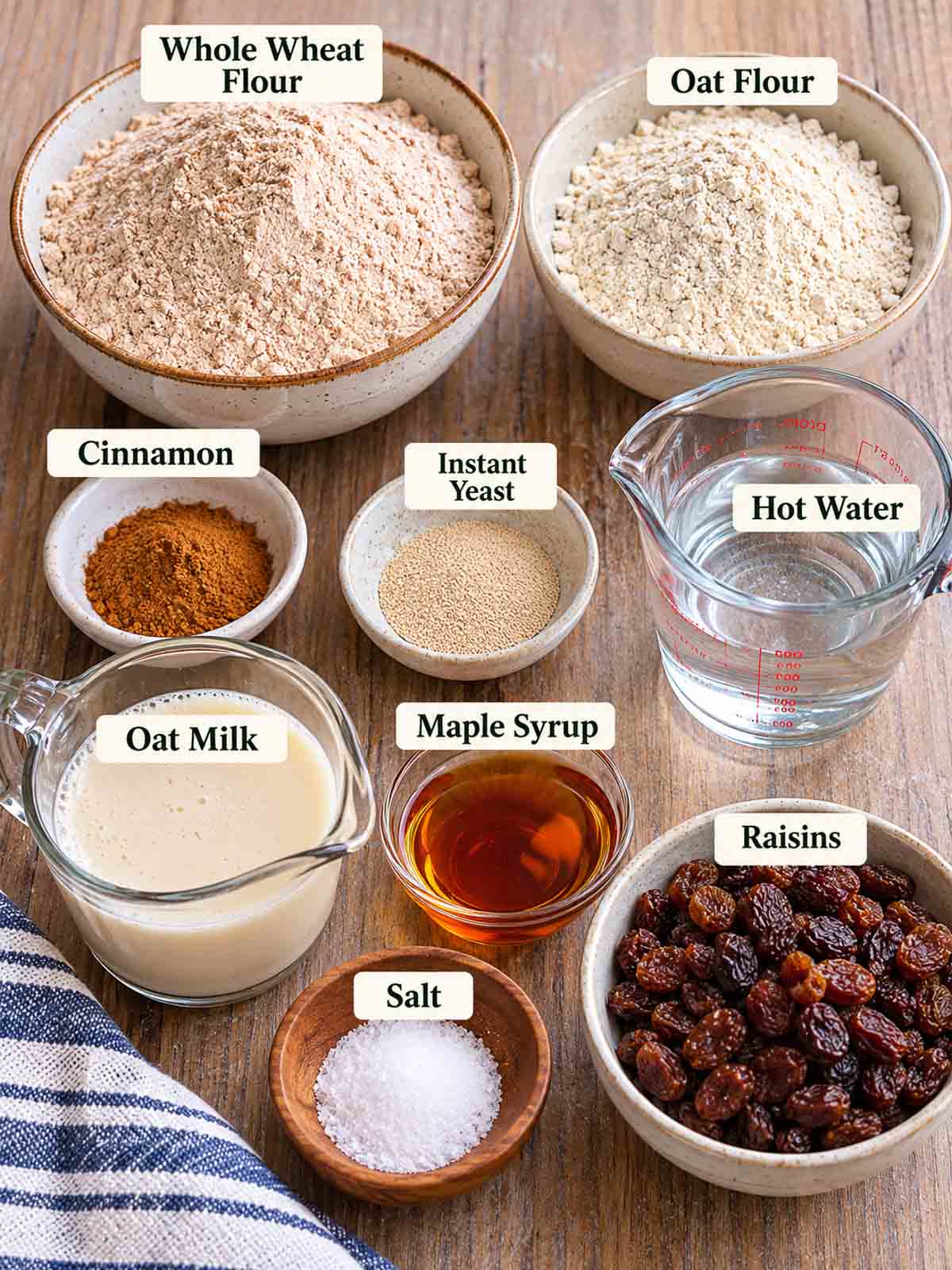 labeled ingredients for making homemade cinnamon raisin bread.